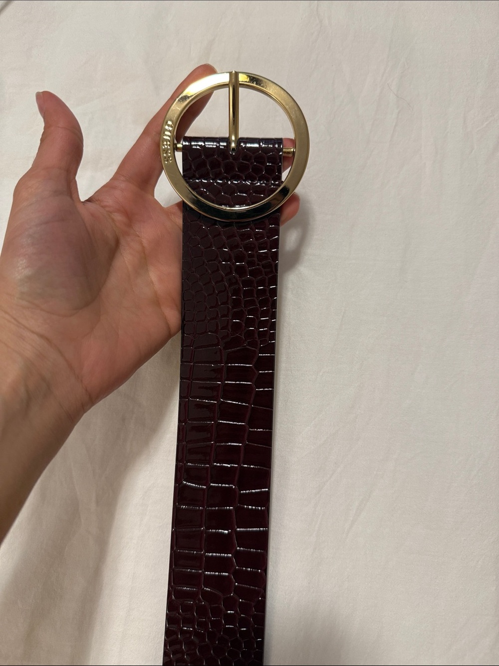 GUESS. Wide Croc-Embossed Burgundy Belt with Gold Round Buckle